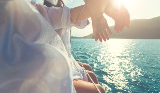 People relaxing on a yacht